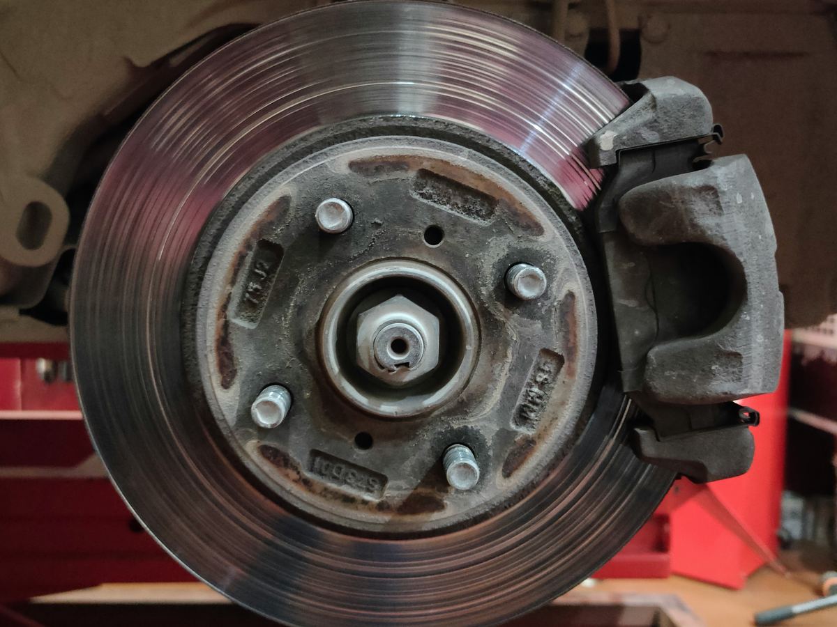 grinding noise when braking - worn brake rotor and caliper